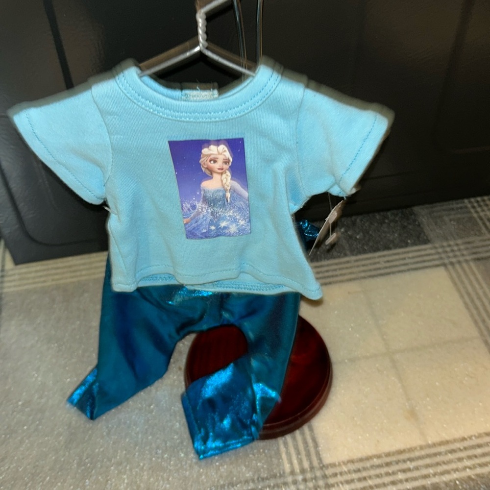 Frozen outfit 
Elsa shirt and shiny pants